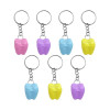 Tooth-shaped keyring container for baby teeth